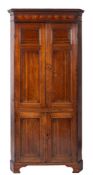 An early 19th Century oak standing corner cupboard:,