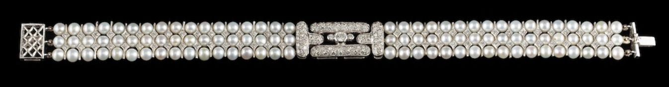 An 18 carat gold diamond and cultured pearl bracelet,