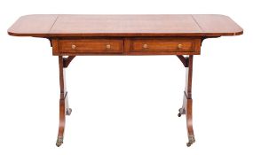 A mahogany and inlaid sofa table in the Regency taste:, bordered with boxwood and ebony lines,