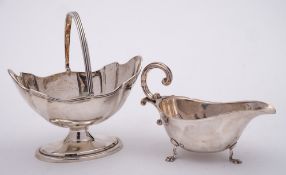 A George V silver swing handled sugar basket, maker Thomas Bradbury & Sons Ltd, Sheffield,