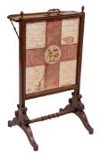 An early 19th Century mahogany firescreen:, with a hinged ledge,