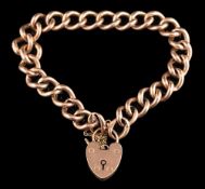 A 9 carat gold curb link bracelet,: the polished links with a padlock clasp, stamped 9c, 18cm long,