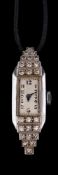 A 1920s platinum and diamond cocktail watch,
