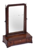 A George III mahogany and inlaid swing frame platform toilet mirror:, bordered with boxwood lines,