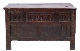 A late 17th/early 18th Century oak rectangular coffer:, with a channel moulded hinged top,