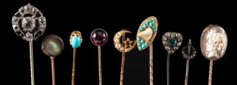 A group of stick pins,: to include,