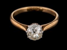 A diamond single stone ring,: the oval old cut diamond, estimated to weigh 1.
