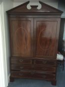 A 19th Century mahogany and inlaid linen press:,