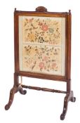 A Victorian carved rosewood firescreen:,