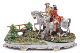 A large Sitzendorf porcelain equestrian group: depicting a courting couple on horseback before a
