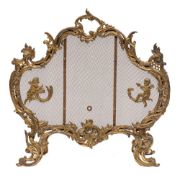 A gilt metal and mesh firescreen in Louis XV style, late 19th /early 20th century,