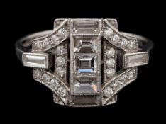 A platinum diamond panel ring,