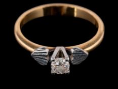 An 18 carat gold and diamond ring,: the brilliant cut diamond, estimated to weigh 0.