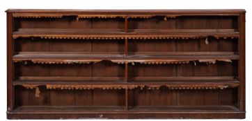 A Victorian mahogany low open bookcase:, having a moulded edge and rounded corners,