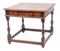 A late 17th Century oak side table:, the almost square top with a moulded edge,