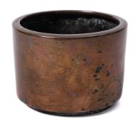 A Chinese bronze censer: of plain cylindrical form with flattened rolled rim, Qing Dynasty,