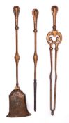 A set of Art Nouveau influence brass fire tools: includes poker, tongs and shovel. (3).
