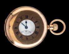 A 9 carat gold half hunter pocket watch,: the white enamel dial with black Roman numerals,