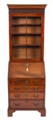 A George III mahogany bureau:, and associated 19th Century bookcase of small size,