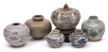 A group of four small Chinese Swatow and South East Asian jars,