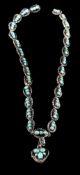 A late 19th Century enamelled and turquoise mounted necklace,