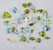 A group of loose gemstones,