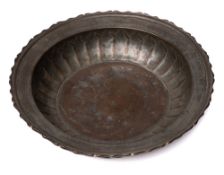 A 19th century Persian bronze bowl: of circular outline,