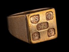 A 9 carat gold signet ring,: the square panel stamped 375 with full Sheffield hallmarks for 1980,