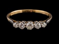 A diamond five stone ring,: set with five old brilliant cut diamonds, approximately 0.