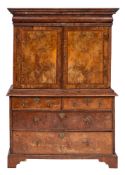 A George II walnut and feather banded cabinet on chest, second quarter 18th century,