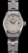 Rolex, Oyster Perpetual, a stainless steel wristwatch,: the silvered dial with baton markers,