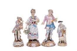 A group of four Continental porcelain figures: in the Meissen manner,