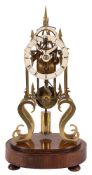 A brass skeleton clock with subsidiary seconds dial: the eight-day duration single chain-fusee