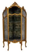 A contemporary carved giltwood vitirine in the French taste:,