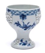 A rare First Period Worcester blue and white egg cup: applied with flower sprigs,