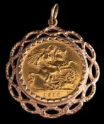 A half sovereign pendant,: the half sovereign, 1910, in a pendant mount,