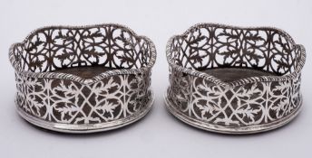 A pair of William IV silver circular coasters, maker Edward Farrell, London,