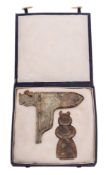 An oriental jade ornamental axe head: of T-shaped outline16cm wide together with a jade figure