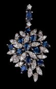 An 18 carat gold sapphire and diamond pendant,