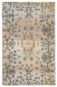 An 18th century silk panel: of rectangular outline, with central cartouche medallion,