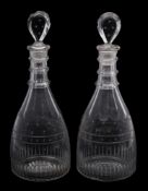 A pair of late 18th century cut glass decanters and stoppers: each with lozenge stopper and triple