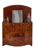 A George IV gentleman's mahogany and inlaid bow-fronted dressing chest:,