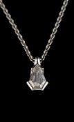 A diamond pendant,: the fancy cut diamond estimated to weigh 0.