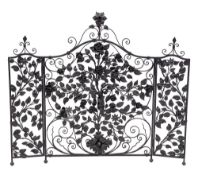 A painted wrought iron three fold firescreen, 20th century,