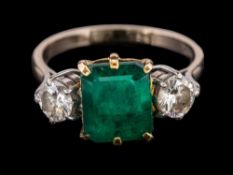 An emerald and diamond ring,
