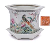 A Chinese famille rose jardiniere and stand: of flared hexagonal form,