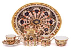 A Royal Crown Derby miniature cabaret set: decorated in the 'Rich Imari' pattern 1128,