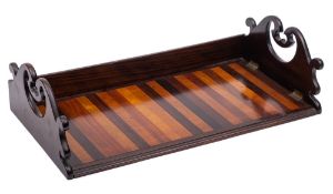 A Victorian rosewood and specimen wood book trough: of rectangular outline with folding arched ends