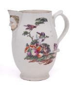 A Derby mask jug: of ovoid form with scroll handle,
