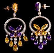 A pair of multi coloured cubic zirconia earrings,